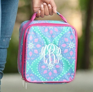 carrying an insulated lunch box Carrying an insulated lunch box.